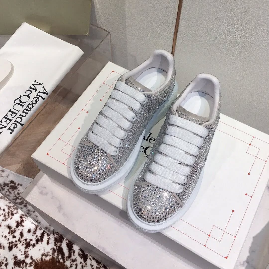 Pallet of authentic Alexander McQueen Oversized Sneakers in original retail boxes for wholesale luxury resale